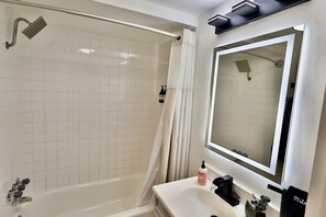 Hair dryer, towels, soap, shampoo