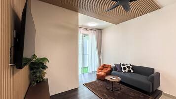 Apartamento, 3 quartos, sacada, vista para a cidade | Sala de estar