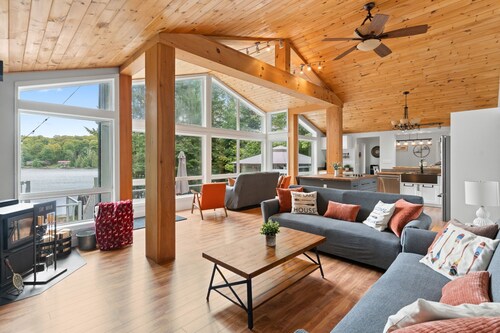 Private lakeside home that blends luxury with laid-back charm year-round!