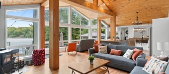 Private lakeside home that blends luxury with laid-back charm year-round!