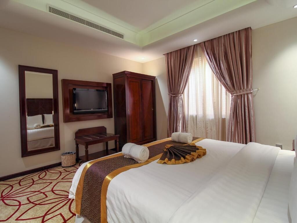 Coffres-forts dans les chambres, fer et planche à repasser