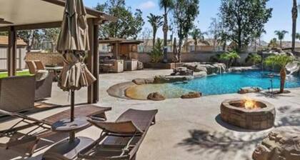 Enjoyable 4-bedroom house with a beautiful rock water fall slide swimming pool.