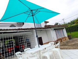 บ้านพัก, 4 ห้องนอน, สระว่ายน้ำส่วนตัว, วิวสวน | รับประทานอาหารกลางแจ้ง
