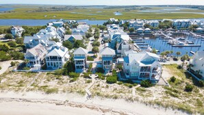A coastal residential area with houses, a marina, and a beach. - Welcome to one of the Island (Bald Head Island)