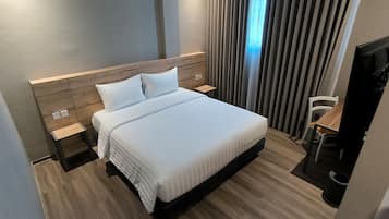Deluxe Double Room, City View | Desk, laptop workspace, iron/ironing board, free WiFi