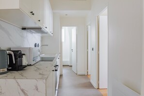 Fridge, microwave, oven, stovetop - Blueground | Europe, view, nr Parc Monceau (Paris)