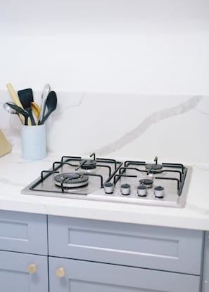 Fridge, microwave, stovetop, coffee/tea maker