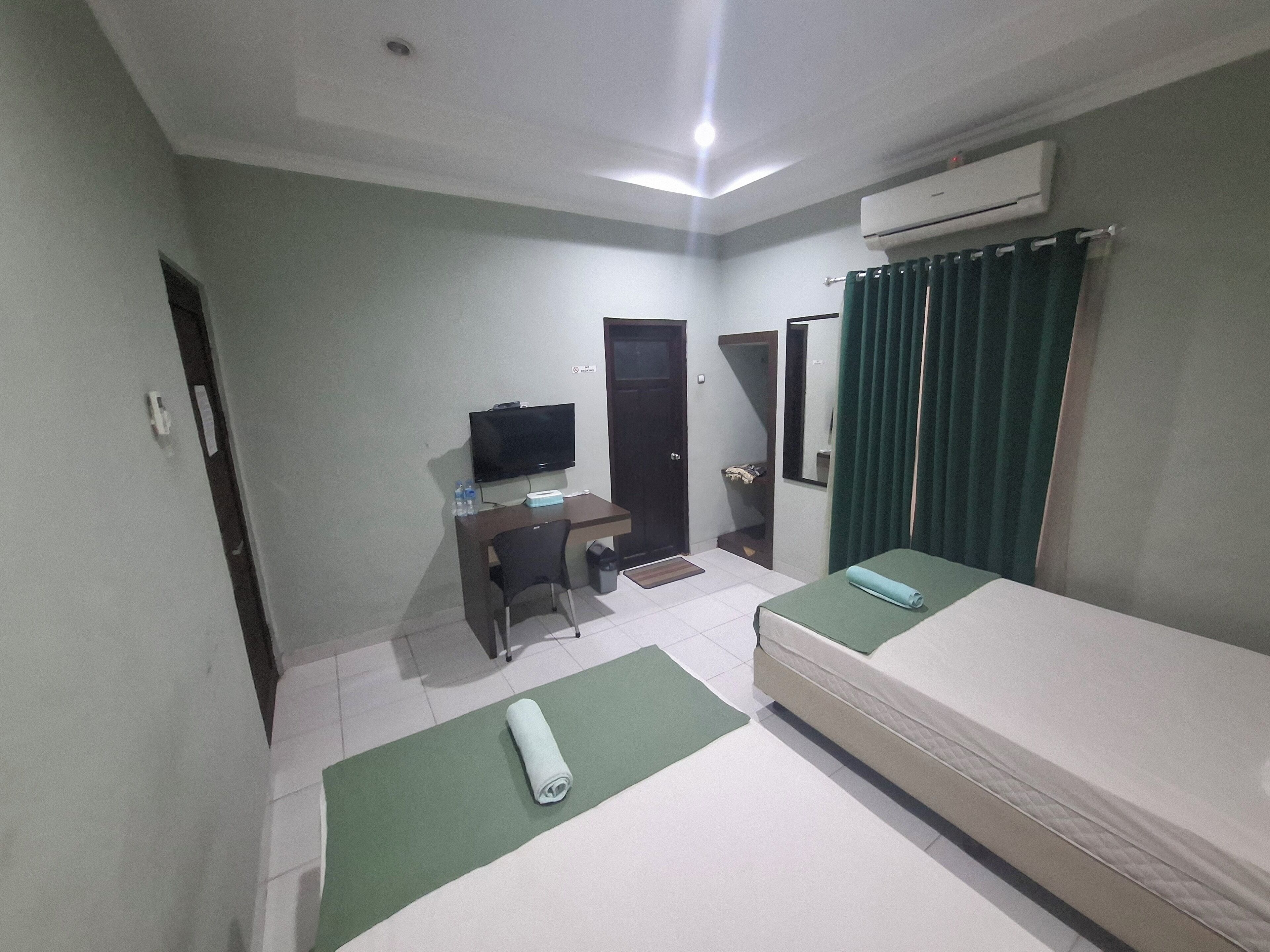 Habitación estándar con 2 camas individuales | Wifi gratis y ropa de cama