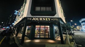 The Journey Hotel with a prominent logo, a signboard, and a visible entrance. - The Journey Hotel Penang (George Town)
