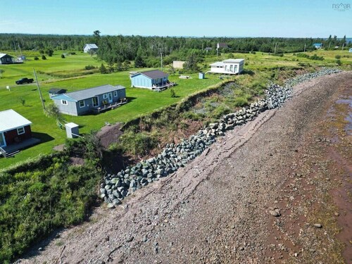 Stunning beachfront cottage on Nova Scotia's exclusive North Shore Sunset Coast!