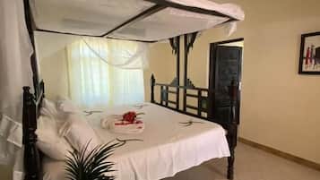 Habitación individual Deluxe, balcón, vistas al jardín | Decoración individual, mobiliario individual, wifi gratis y ropa de cama