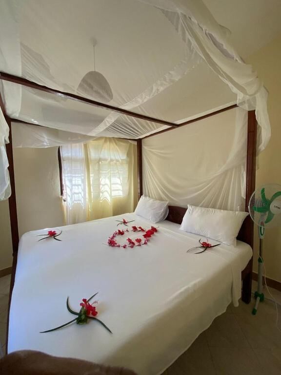 Deluxe Single Room, Balcony, Garden View | Dihias secara berasingan, dilengkapkan perabot secara berasingan 