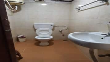 Standard Triple Room | Bathroom | Shower, rainfall showerhead, towels, soap