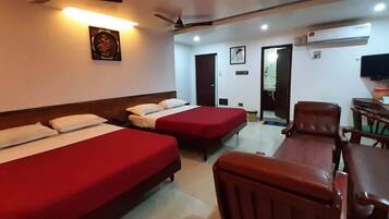 Deluxe Quadruple Room | Premium bedding, desk, free WiFi, bed sheets