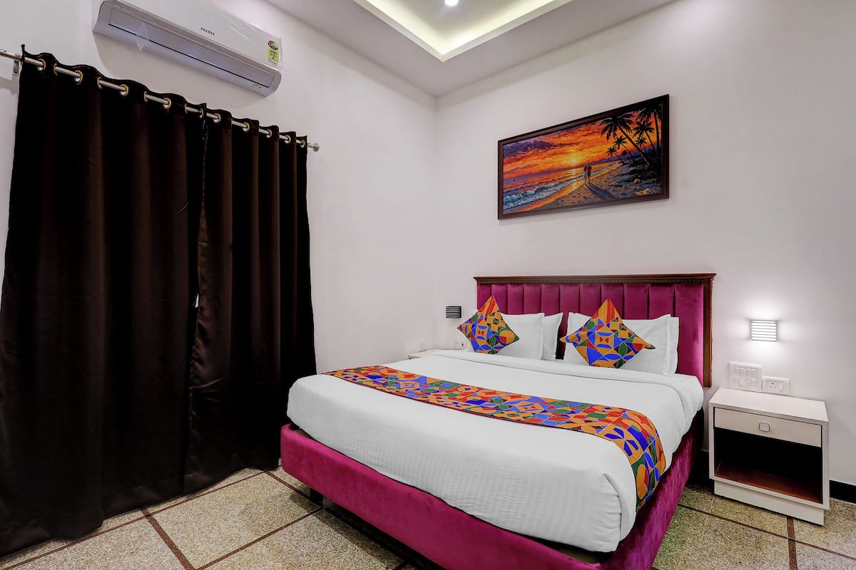 Chambre Deluxe | Draps en coton égyptien, literie de qualité supérieure, Wi-Fi gratuit