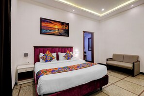 Habitación Deluxe | Sábanas de algodón egipcio, ropa de cama de alta calidad y wifi gratis 