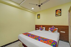 Habitación Deluxe | Sábanas de algodón egipcio, ropa de cama de alta calidad, caja fuerte