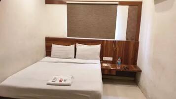 Luxe suite | Lakens van Egyptisch katoen, luxe beddengoed, een kluis op de kamer