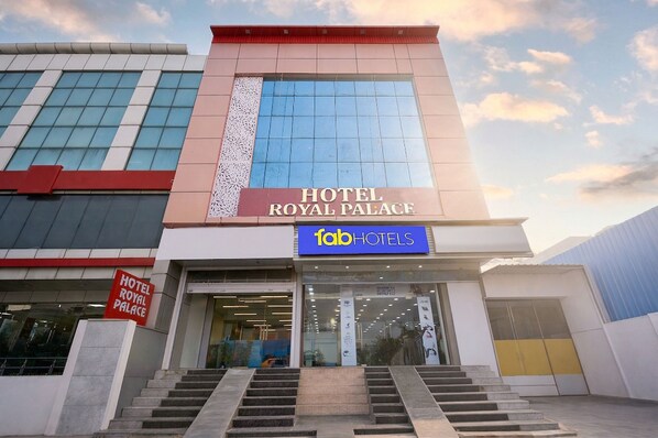 A hotel facade with a sign for 'HOTEL ROYAL PALACE' and 'fabHOTELS' branding. - Fabhotel Royal Palace Peera Garhi (New Delhi)