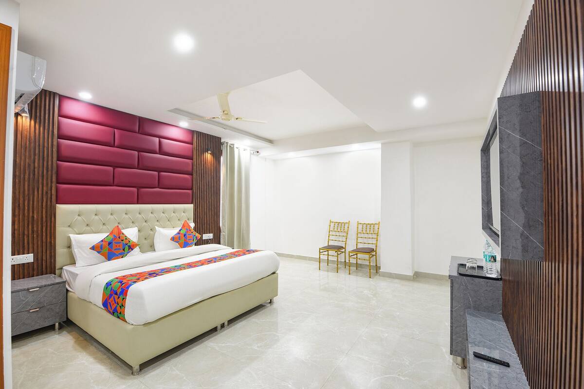 Chambre Prestige | Draps en coton égyptien, literie de qualité, coffre-fort