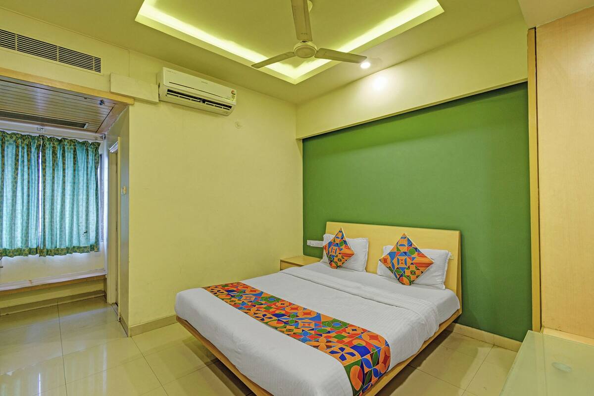 Chambre Deluxe | Draps en coton égyptien, literie de qualité, coffre-fort