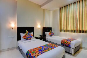 Egyptian cotton sheets, premium bedding, in-room safe, free WiFi - Fabhotel Gargi Residency (Pune)