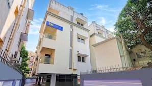 A building with a sign for 'fab HOTELS' indicating a hotel property. - Fabhotel Neha (Chennai)