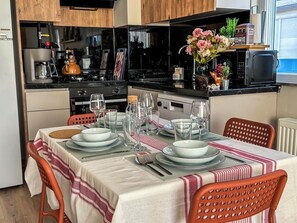 Private kitchen - Chic 2BR City Center Flat | Walk to Old Town &Tram (Antalya)