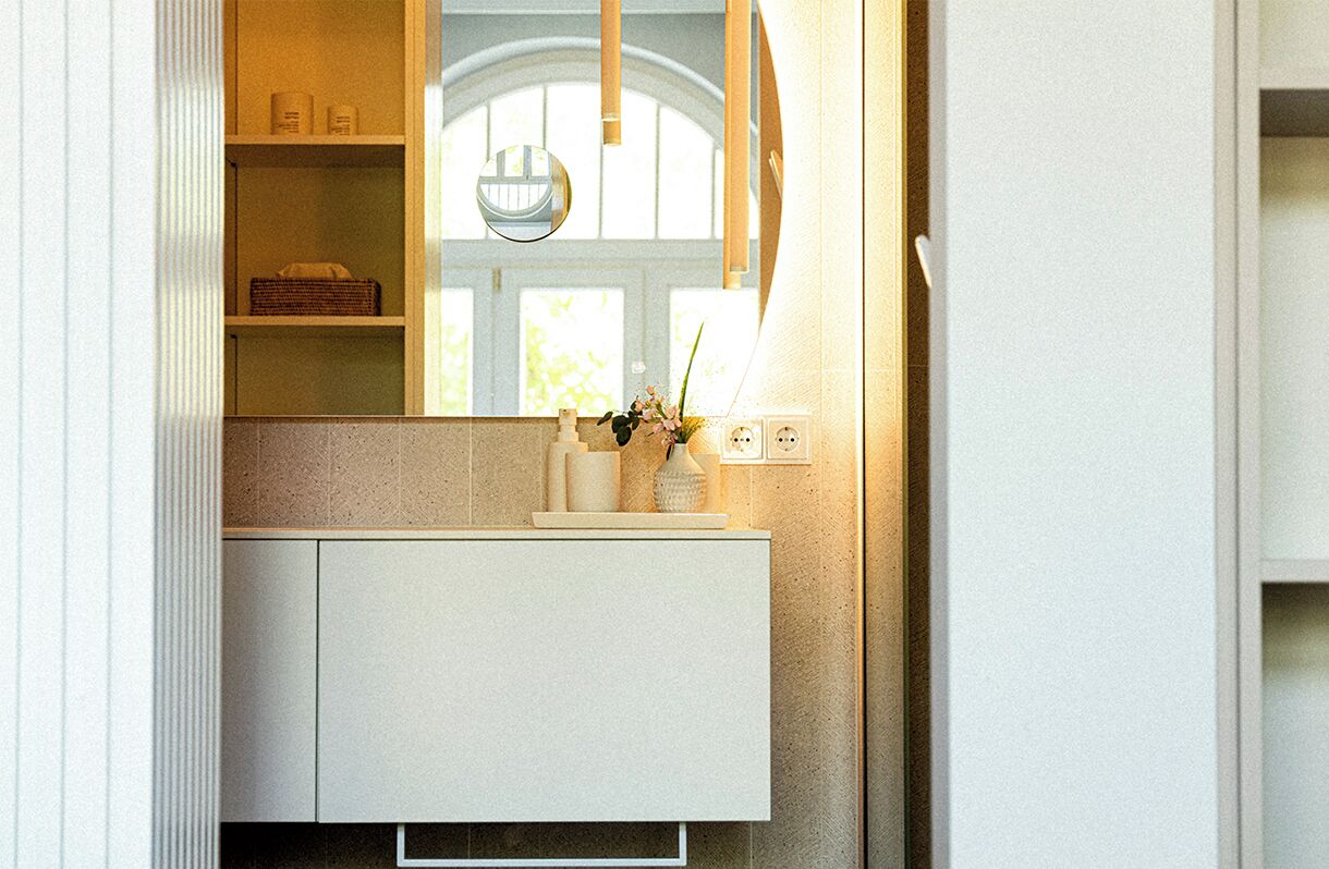 A bathroom with a white vanity, a mirror, and a hanging light fixture.