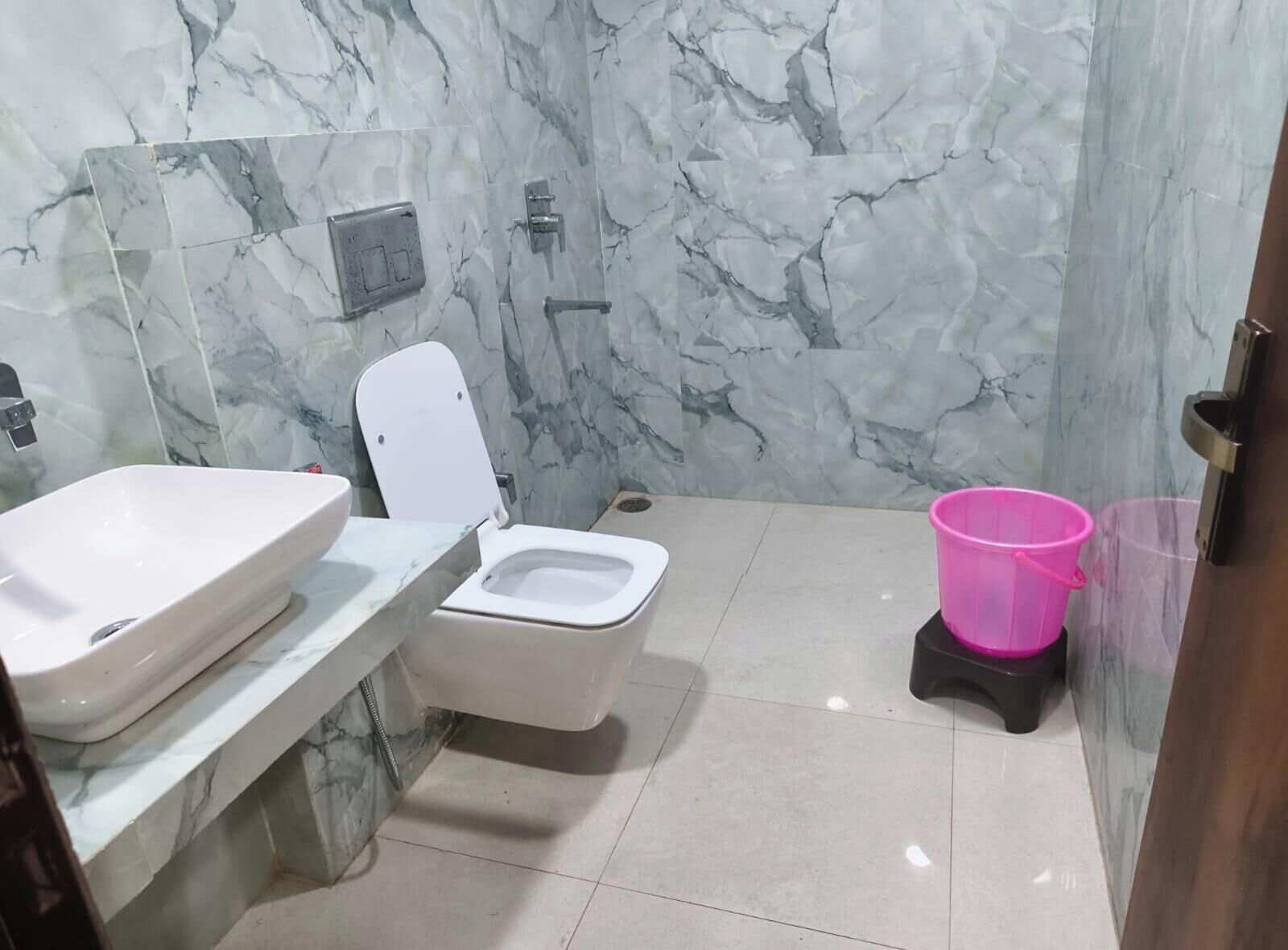 Shower, free toiletries, slippers, towels