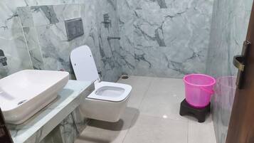 Shower, free toiletries, slippers, towels