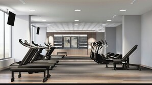 A gym with treadmills, stationary bikes, and weight machines. - Fairfield Inn & Suites San Luis Potosi Los Lagos (San Luis Potosi)