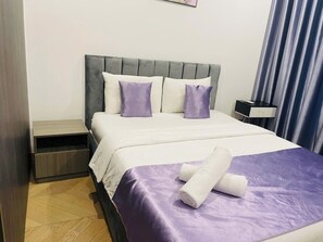 In-room safe, desk, laptop workspace, blackout curtains - Tripluxstay Lumiere Riverside Vacation (An Khanh)