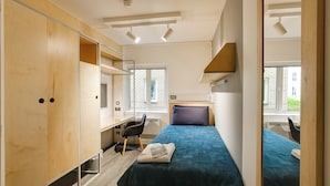 A compact bedroom with a bed, a desk, and a wardrobe. - Harrow Hall Northwick Park  (Harrow)