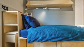 Deluxe Single Room | In-room safe, desk, laptop workspace, blackout curtains