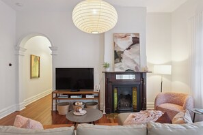 Smart TV, fireplace, books