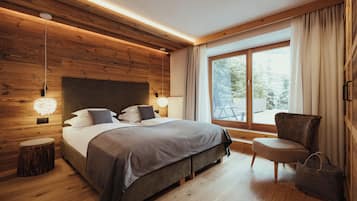 Pütia Lodge | Hochwertige Bettwaren, Daunenbettdecken, Zimmersafe