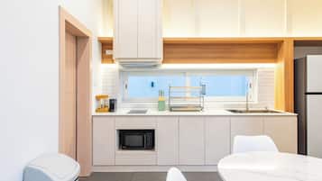 Fridge, microwave, cookware/dishes/utensils