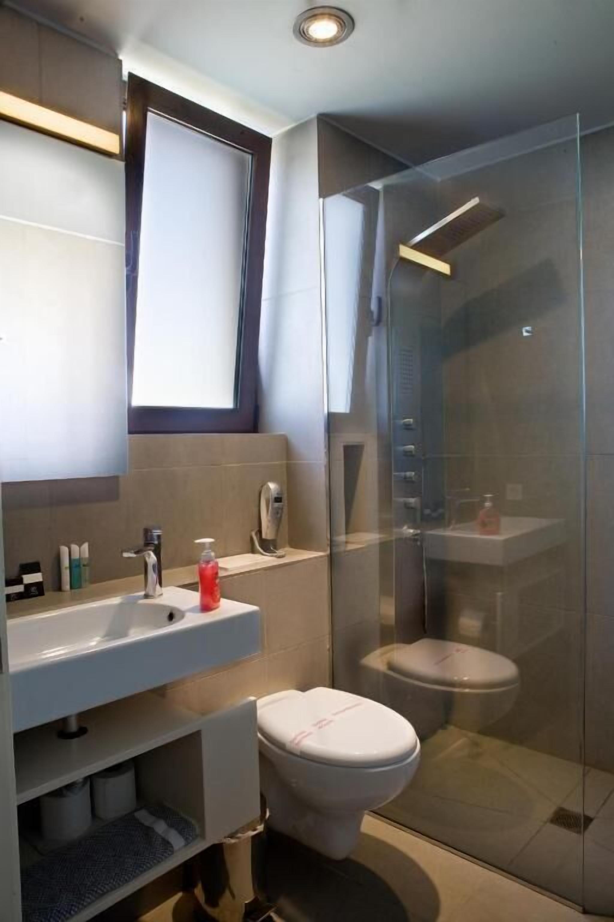 Appartement Deluxe, balcon, vue partielle sur la mer