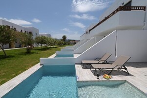 Deluxe Apartment, Private Pool, Partial Ocean View | Pool | Seasonal outdoor pool, open 10:00 AM to 6:00 PM, pool umbrellas