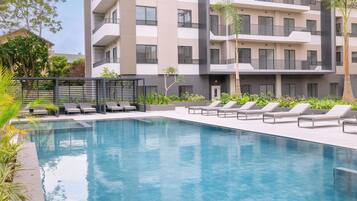 Outdoor pool, free pool cabanas, pool umbrellas