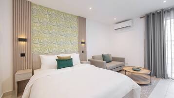 Executive Studio, Balcony, City View | Iron/ironing board, free WiFi