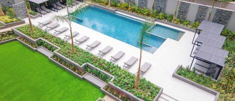 Outdoor pool, free pool cabanas, pool umbrellas