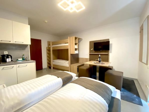 Family Studio | Blackout drapes, iron/ironing board, free WiFi, bed sheets