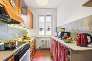 Family Apartment, Multiple Bedrooms, Mountainside (Casa Mirella Full AC And Terrace) | Private kitchen | Fridge, microwave, oven, stovetop - Casa Mirella Full AC And Terrace (Nebbiuno)