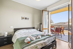 Family Apartment, Multiple Bedrooms, Mountainside (Casa Mirella Full AC And Terrace) | 2 bedrooms, iron/ironing board, free WiFi, bed sheets - Casa Mirella Full AC And Terrace (Nebbiuno)
