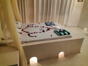 Deluxe-Apartment, Balkon, Gartenblick | Individuell dekoriert, individuell eingerichtet, kostenloses WLAN