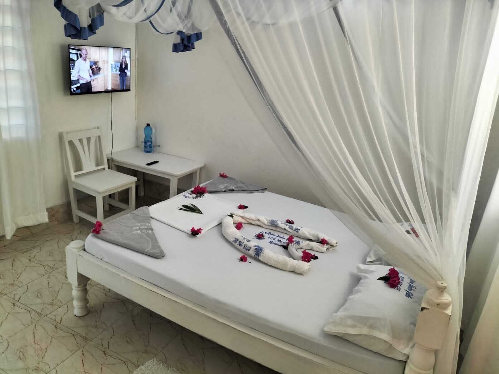 Classic Studio, Balcony, Garden View | Living area | 32-inch Smart TV with digital channels