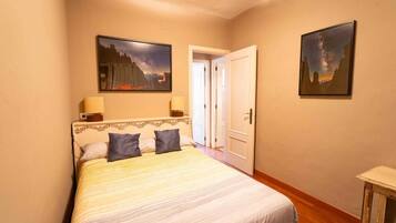 1 chambre, fer et planche Ă repasser, draps fournis
