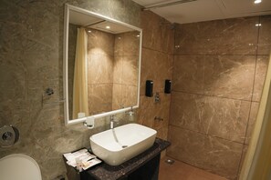 Luxury Suite | Bathroom | Separate bathtub and shower, towels - Hotel Shivam by Greenwoods Resorts (Kudal)